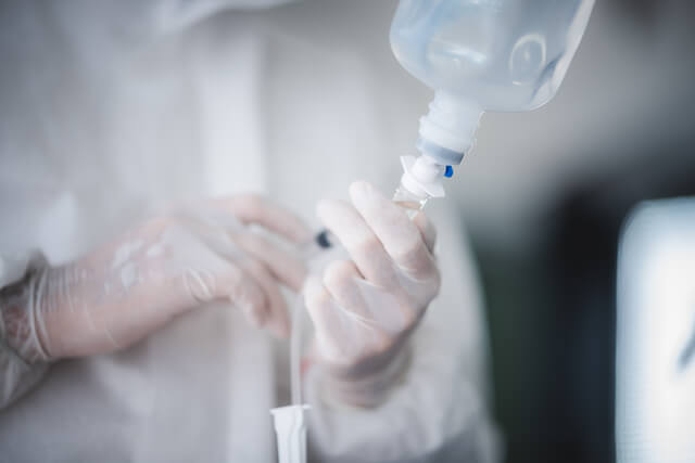 Medical professional preparing IV hydration therapy in Hot Springs clinic