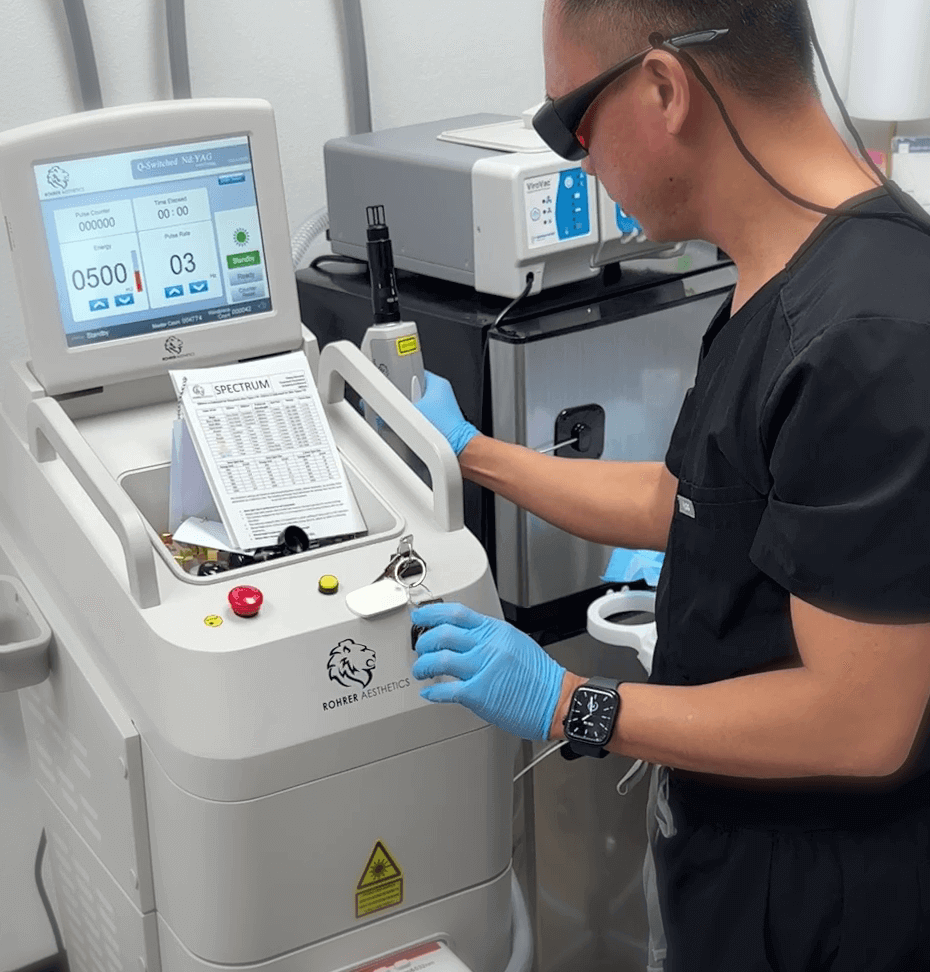 Dr. John Mark Pabona preparing the Spectrum laser system for a skin resurfacing treatment at Embrace Eternal Beauty in Hot Springs